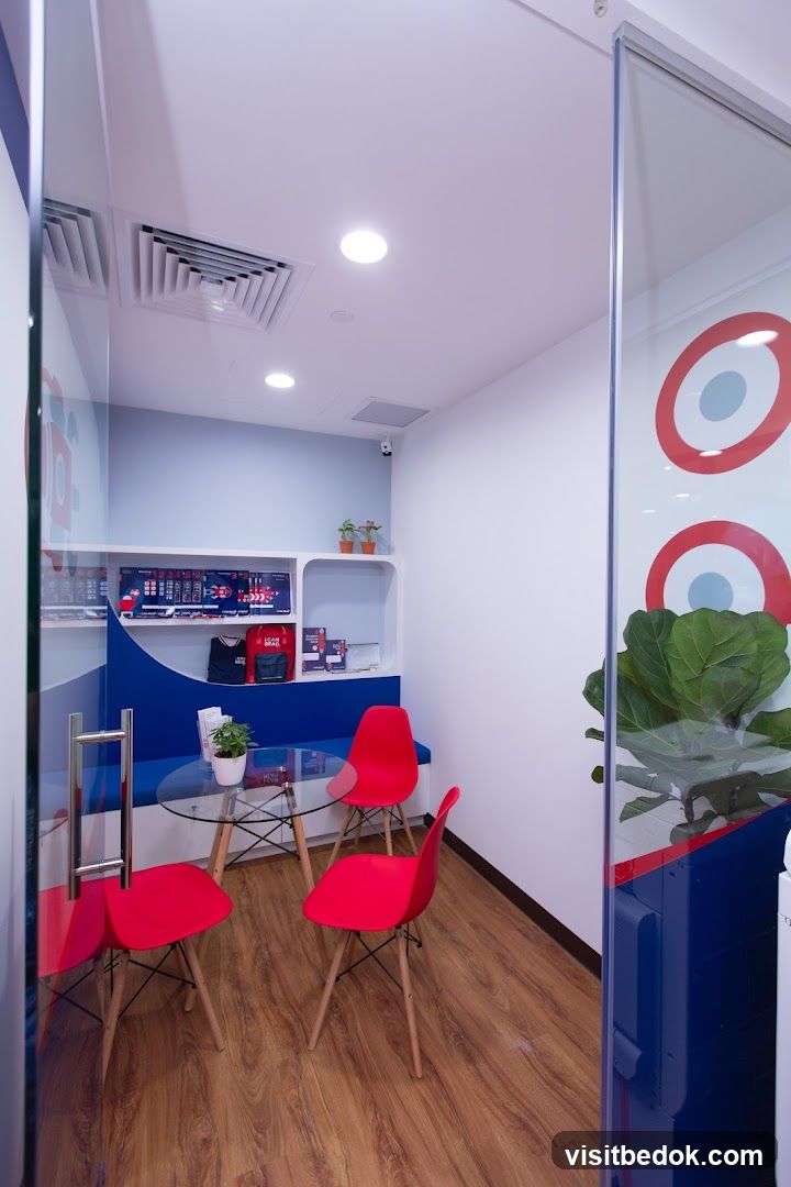 Modern waiting area with red chairs