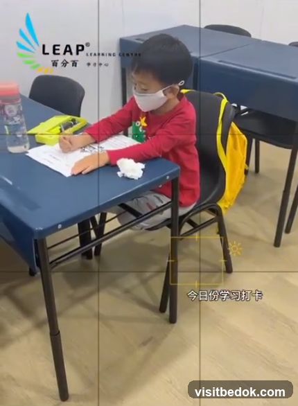 Child studying at a desk