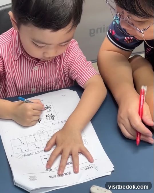 Child Practicing Chinese Characters