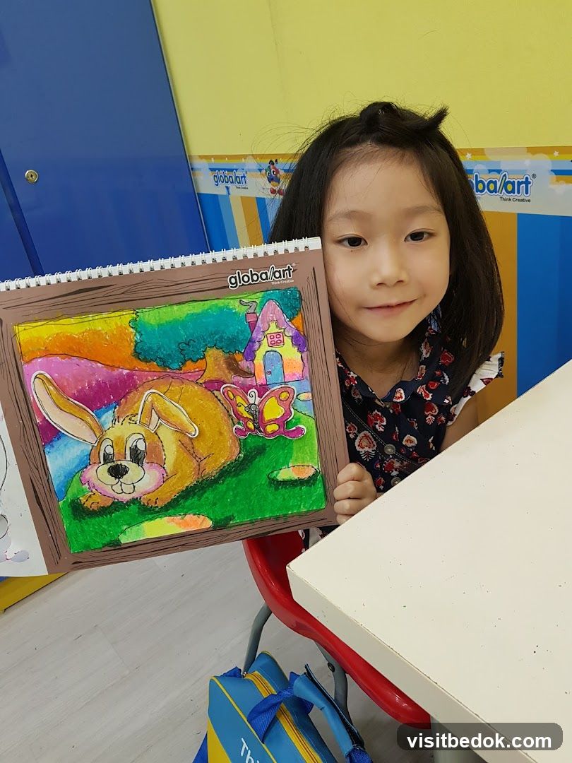 Child Holding Artwork