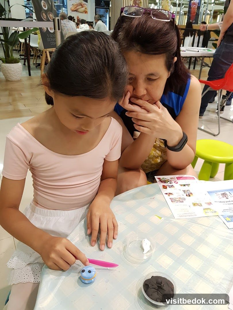 Woman and child doing crafts