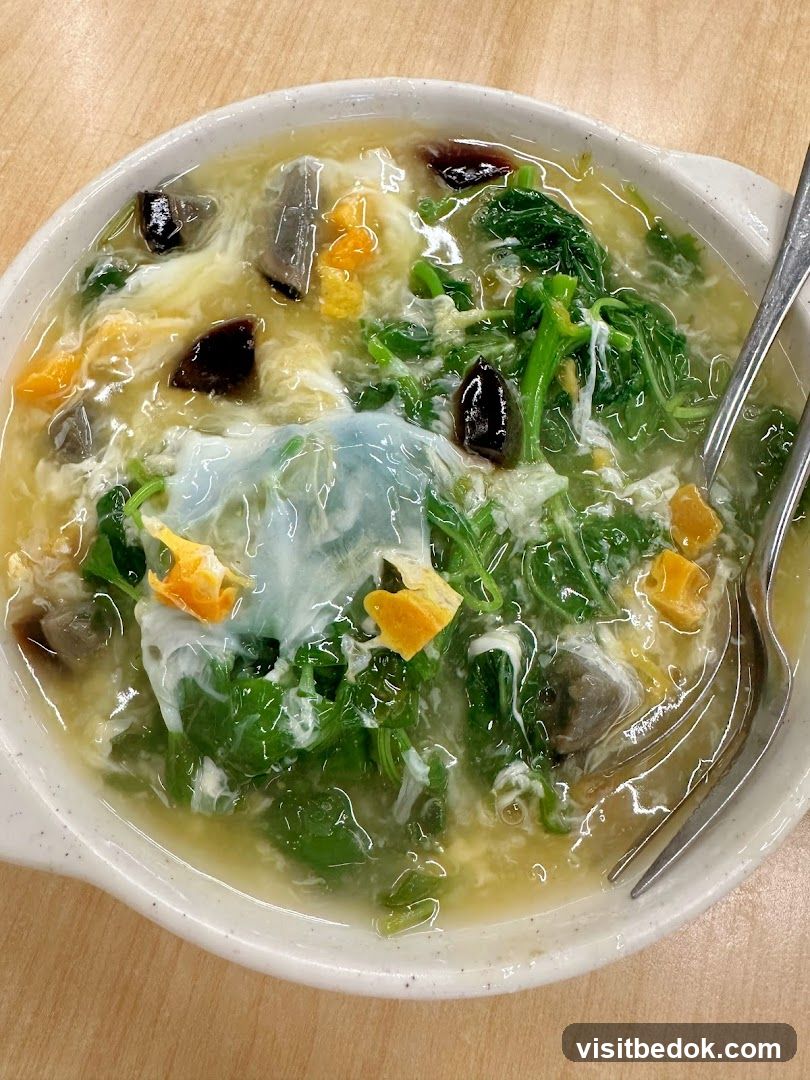 Spinach and Century Egg Soup