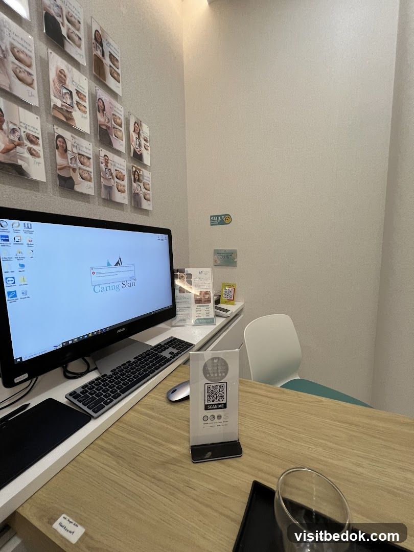 Desk with Computer and Promotional Materials