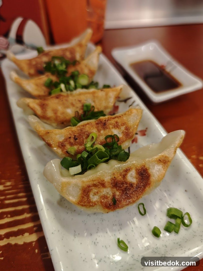 Pan-fried dumplings with green onions