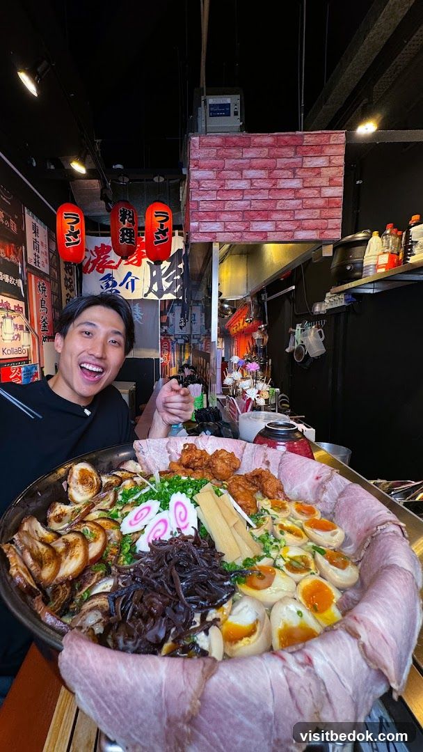 Man with a large bowl of ramen