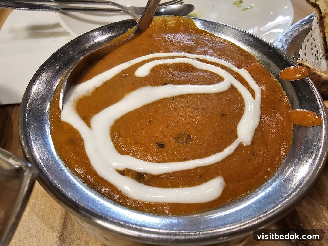Indian Dish with Cream Swirl