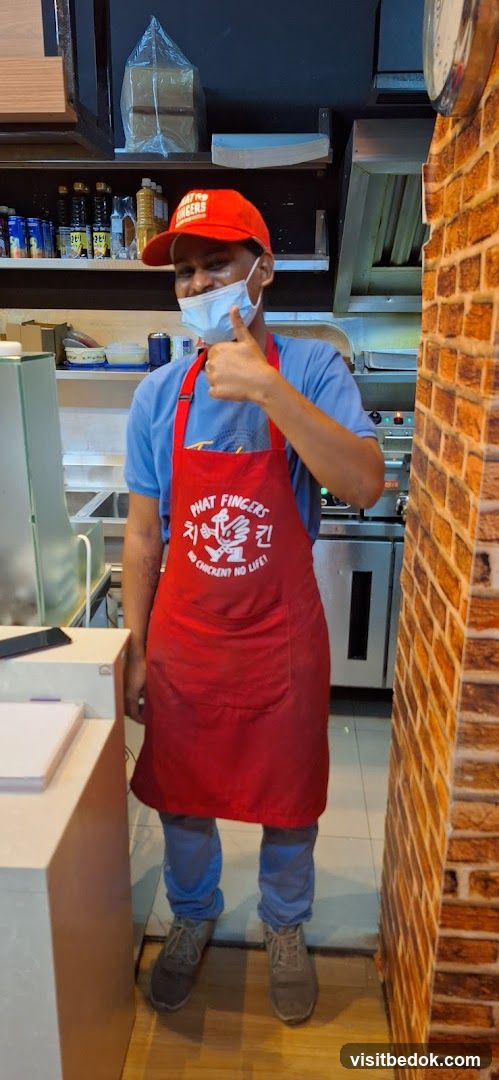 Employee giving a thumbs up