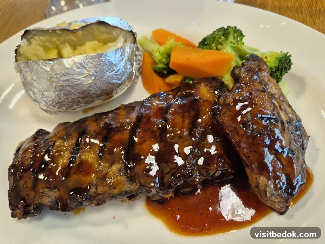 BBQ Ribs with Baked Potato and Vegetables
