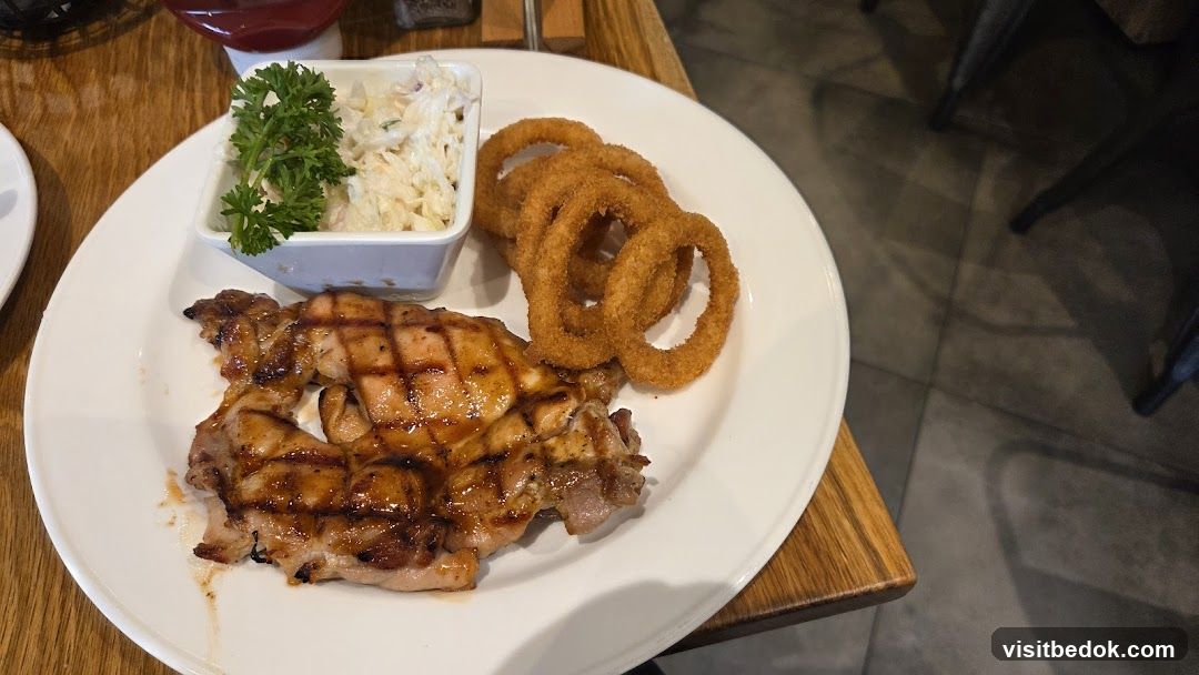Grilled Chicken with Onion Rings and Coleslaw