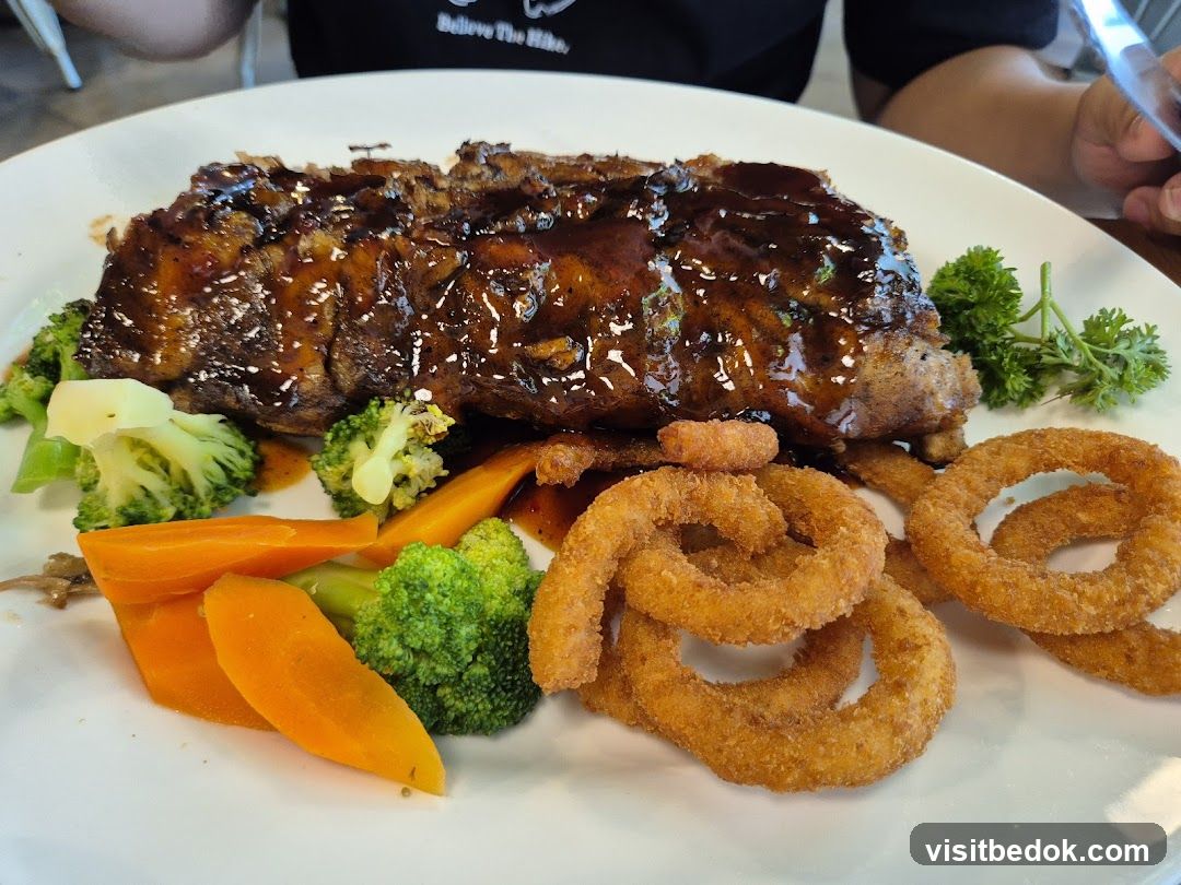 BBQ Ribs with Onion Rings and Vegetables