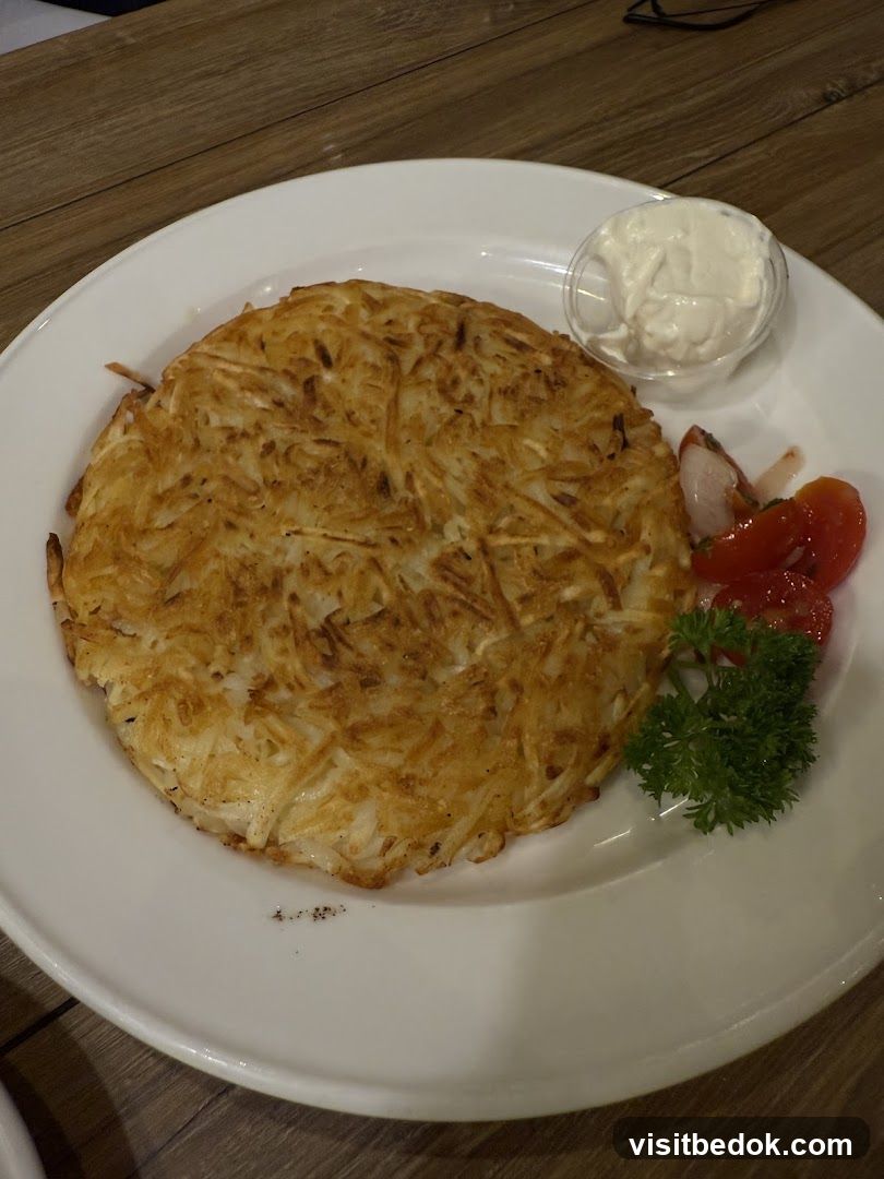 Hash Browns with Sour Cream and Salad
