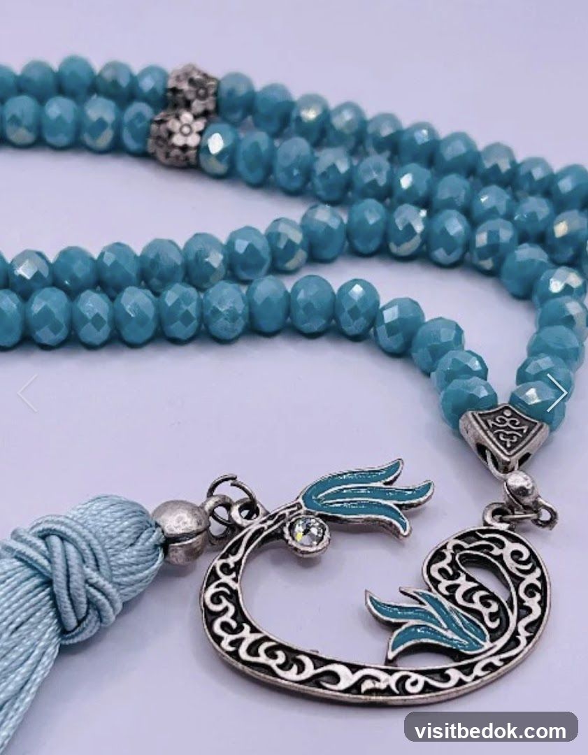 Blue prayer beads with a decorative tassel