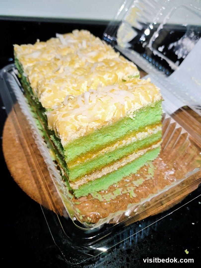 Layered Cake with Coconut Topping