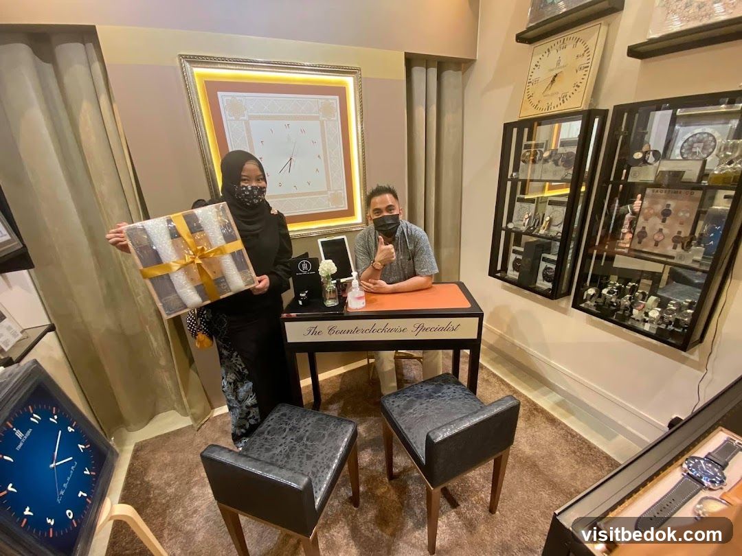 Two people in a watch shop