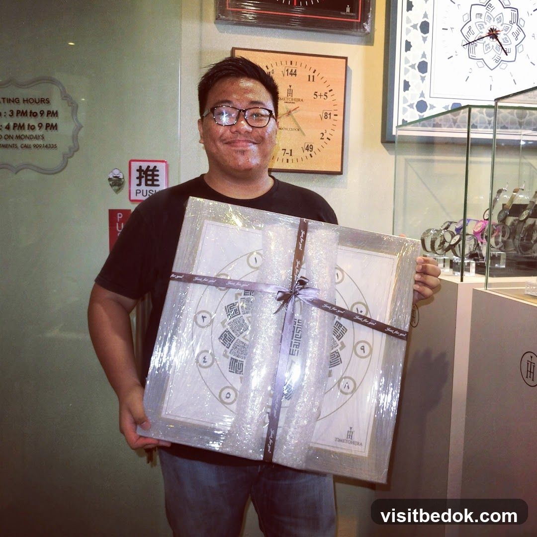 Man holding a framed artwork
