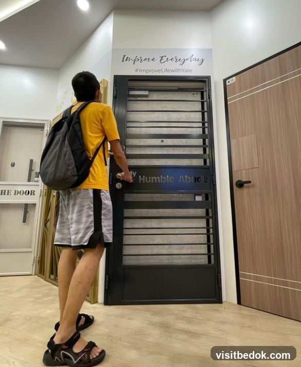 Man examining a security door