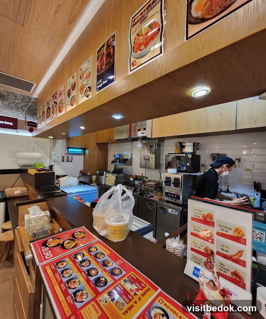 Restaurant Counter with Menu and Staff
