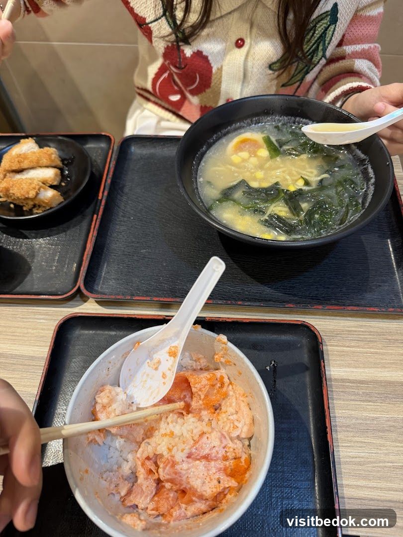 Diners Enjoying Japanese Food
