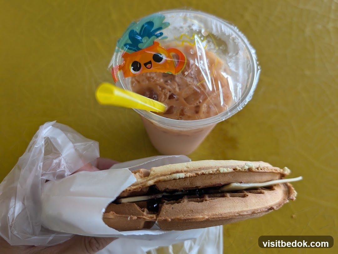 Waffle sandwich and iced drink