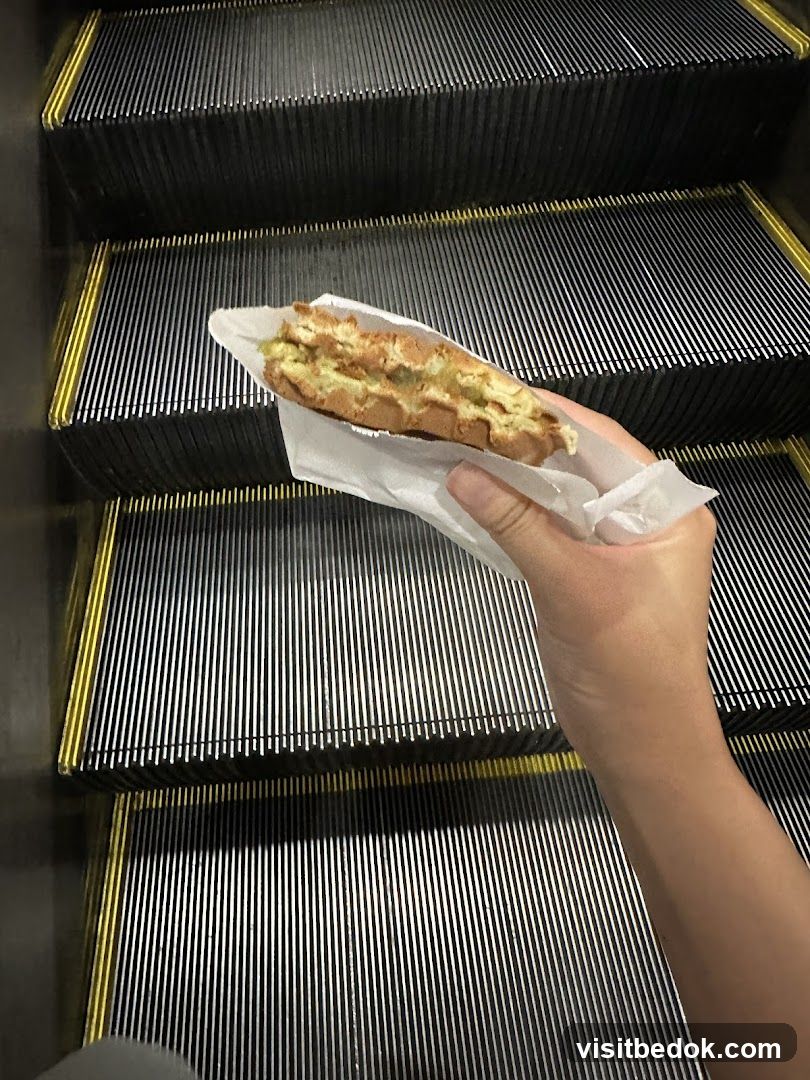 Waffle sandwich on escalator