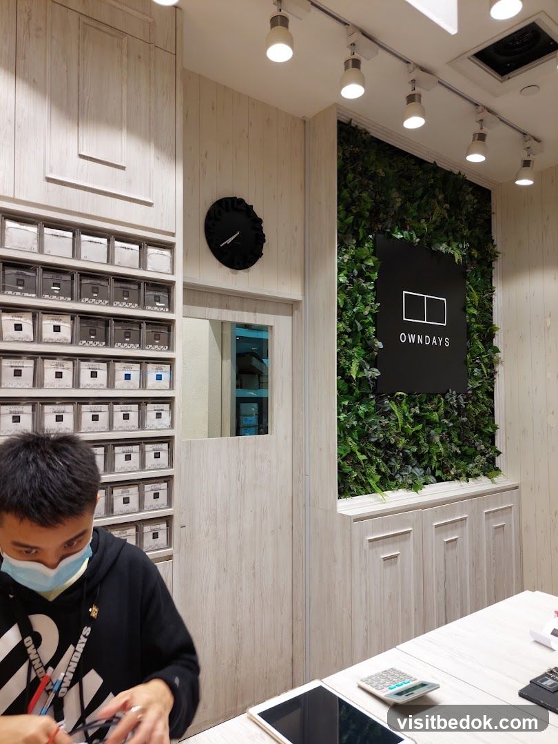 Interior of a store with a person and product displays