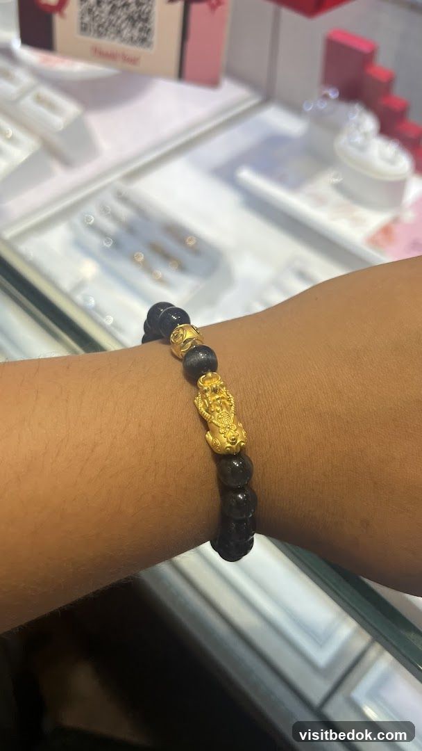 Bracelet with gold charms