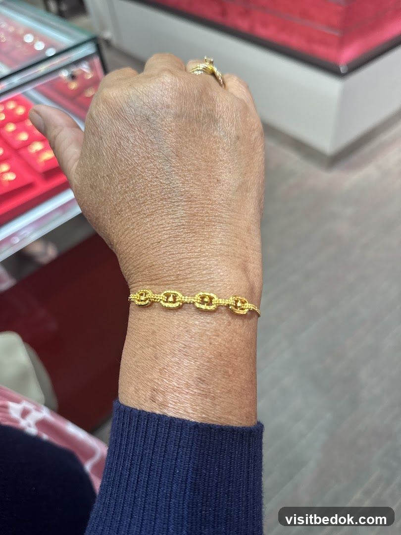 Gold Bracelet on Wrist