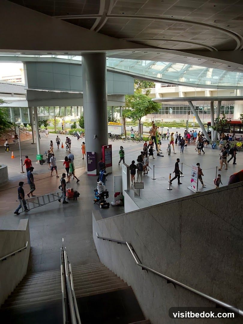 People in a modern outdoor plaza
