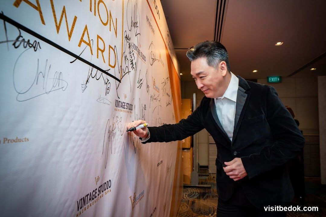 Man Signing a Banner