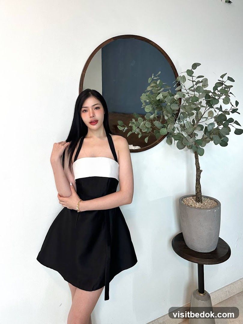 Woman in black and white dress