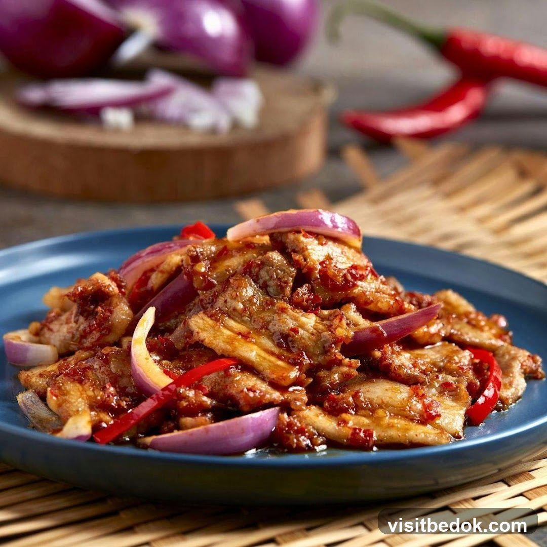 Spicy Pork Belly with Onions and Chili