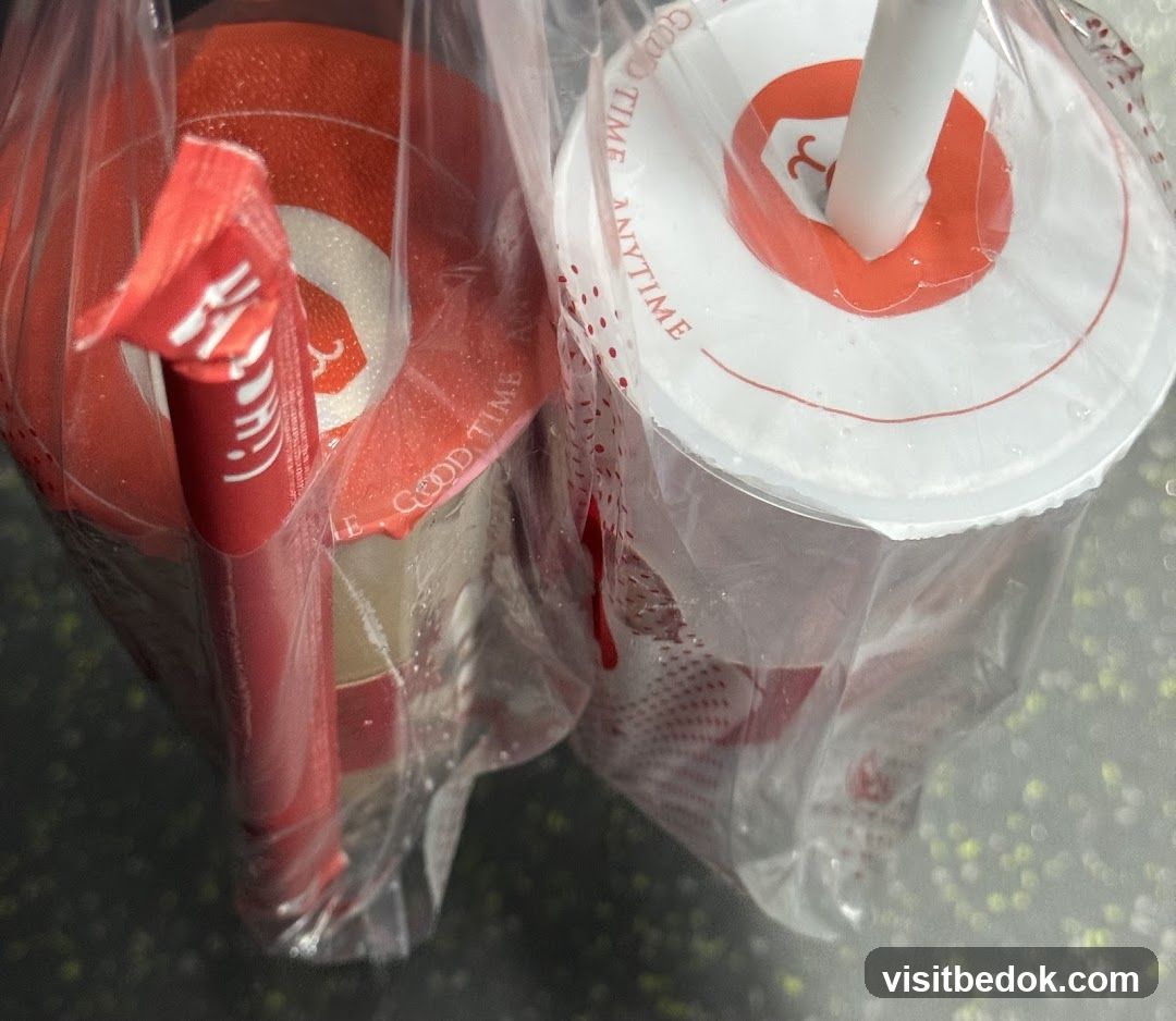 Two drinks in a plastic bag