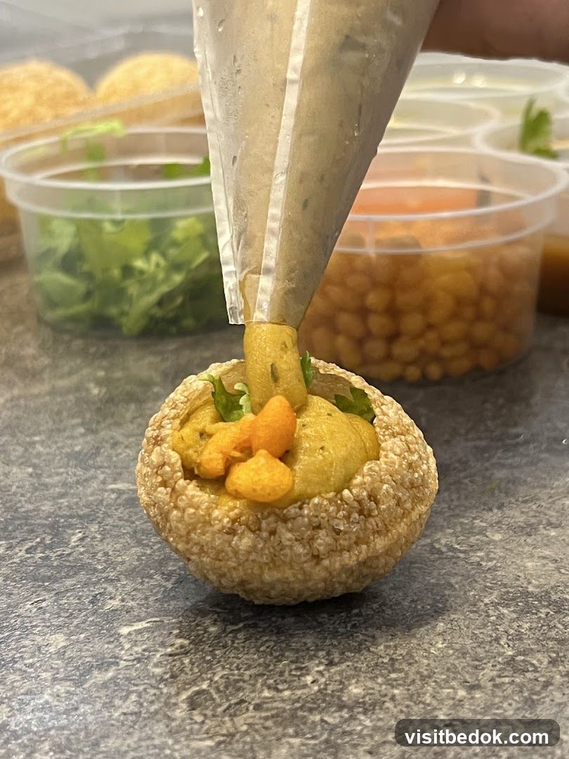 Filling a Pani Puri