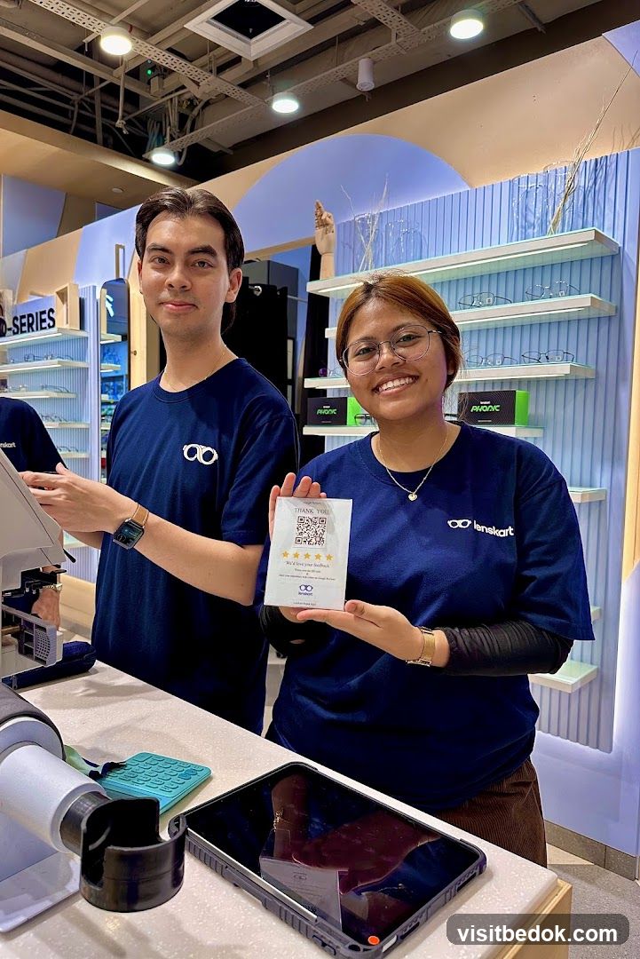 Staff holding feedback card
