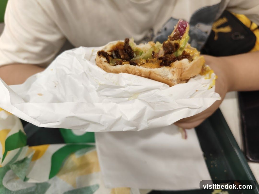 Person holding a sandwich