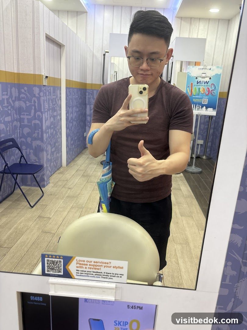 Man taking a selfie in a salon