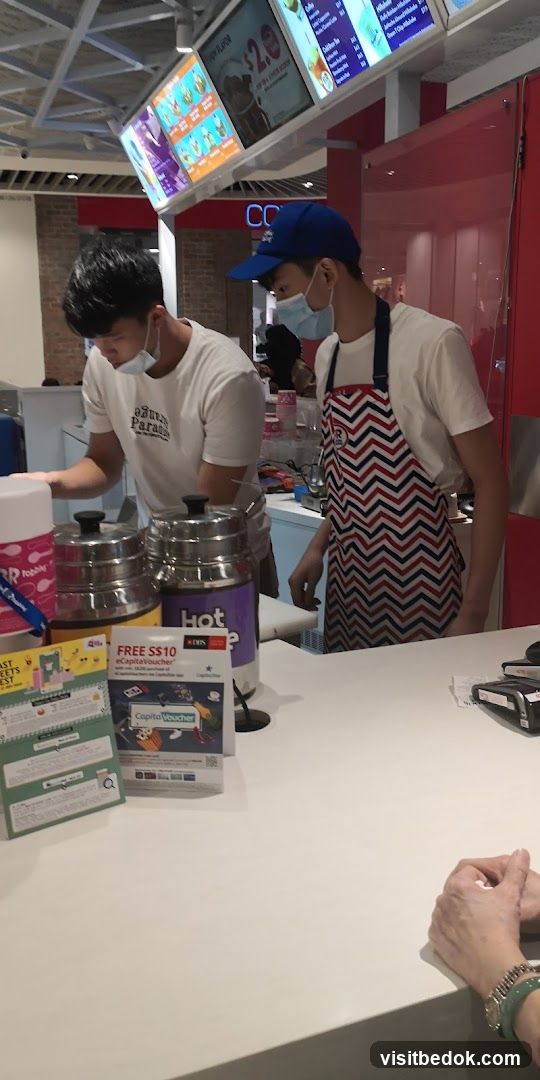 Staff preparing orders at a counter