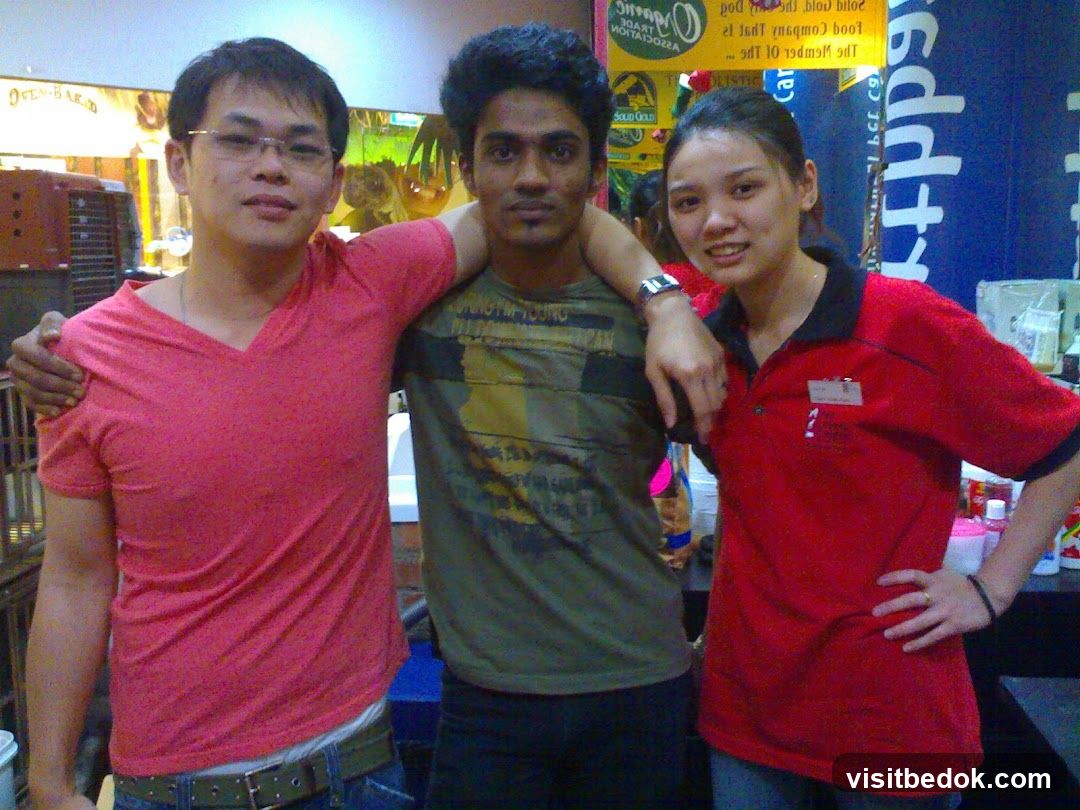 Three people posing for a photo