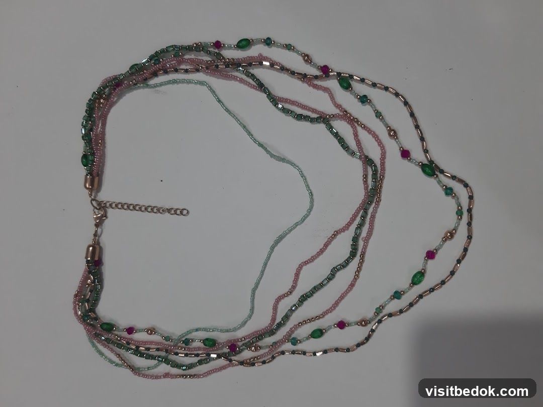 Multi-strand beaded necklace