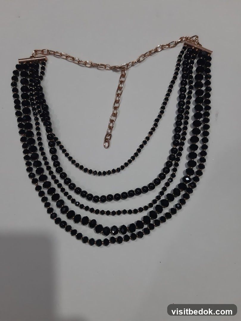 Multi-strand black beaded necklace