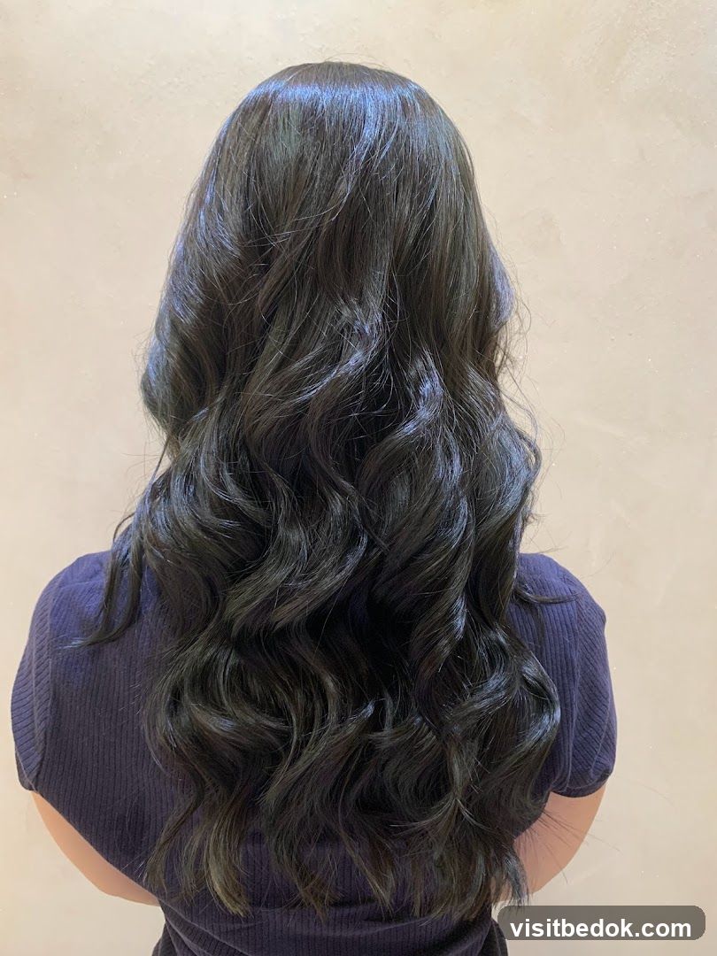 Woman's dark, wavy hair