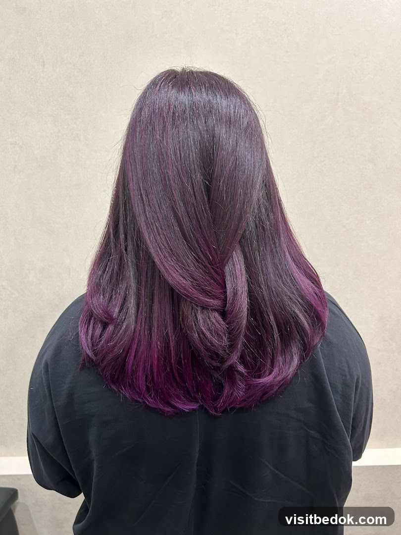 Woman with purple-tinted hair
