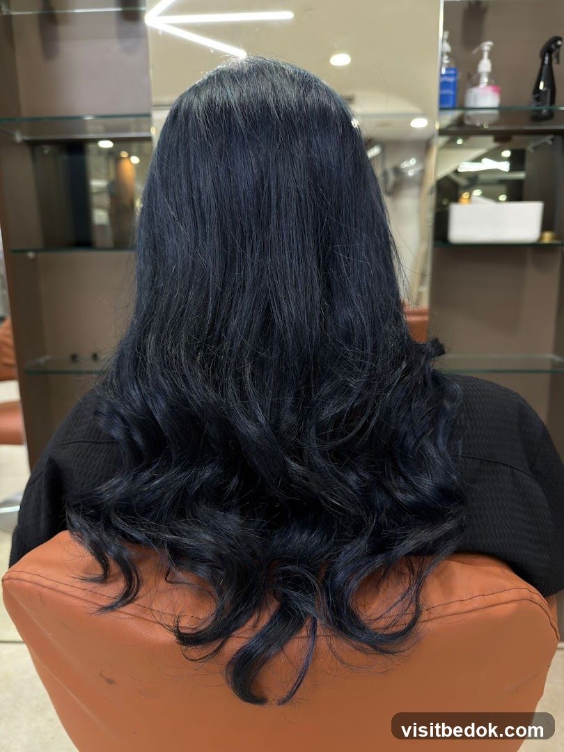 Woman with dark blue hair