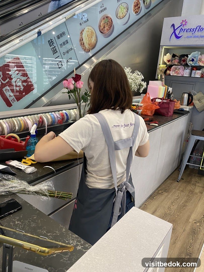 Florist preparing flowers