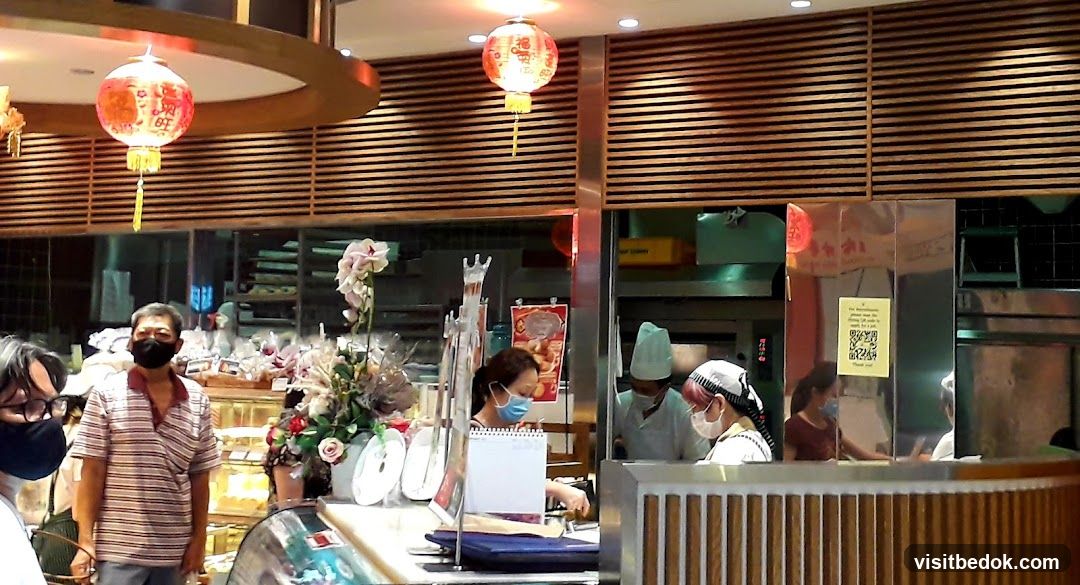 Bakery Interior with Staff and Customers