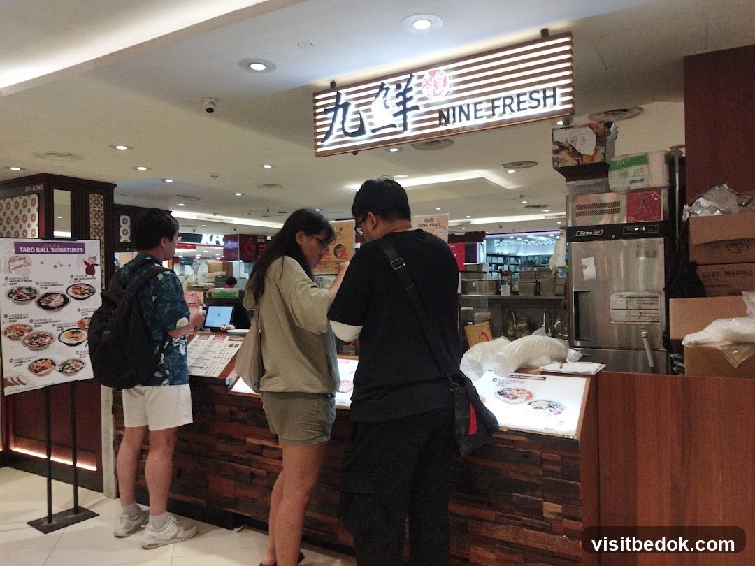 Customers at a Nine Fresh food stall