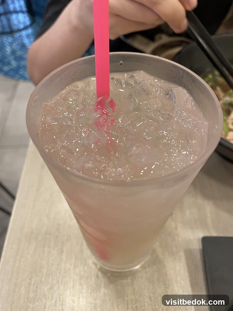 Iced Drink with Pink Straw