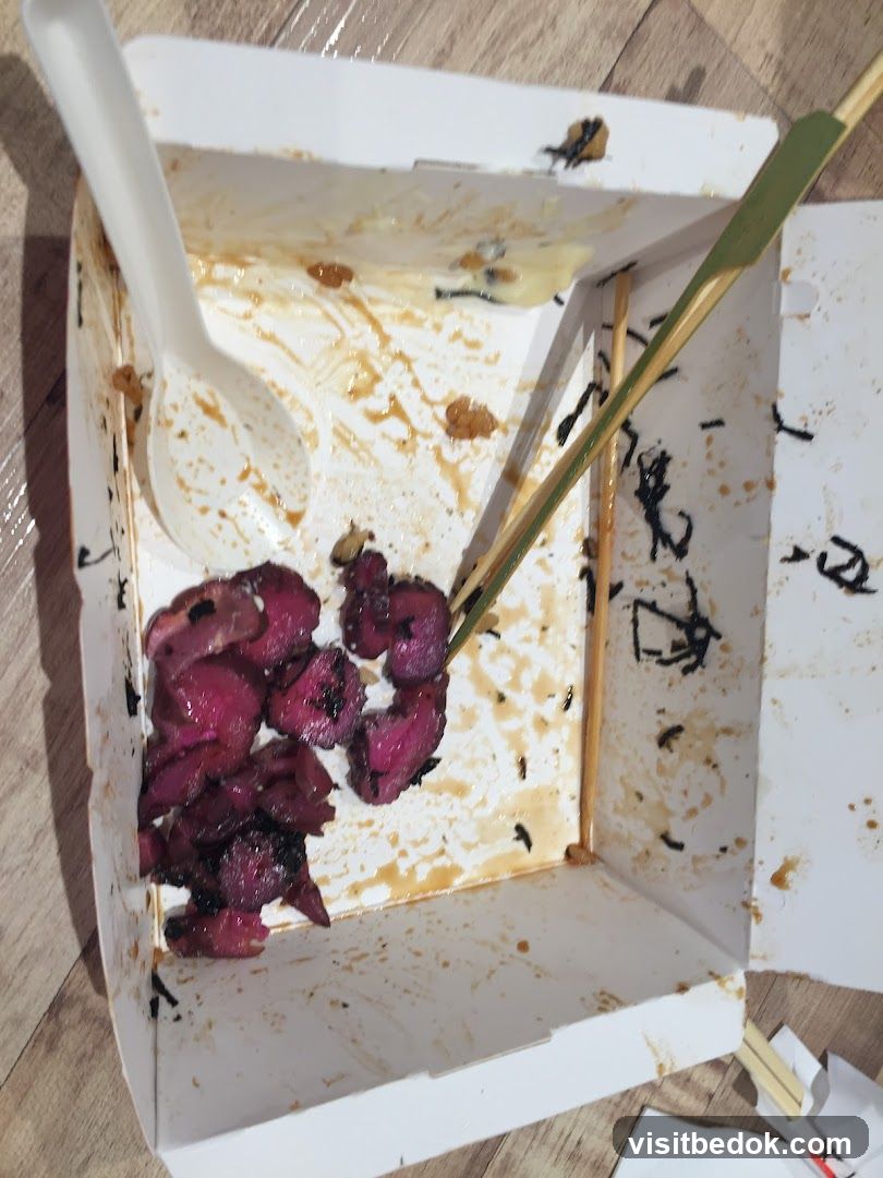 Leftover Food in Takeout Container