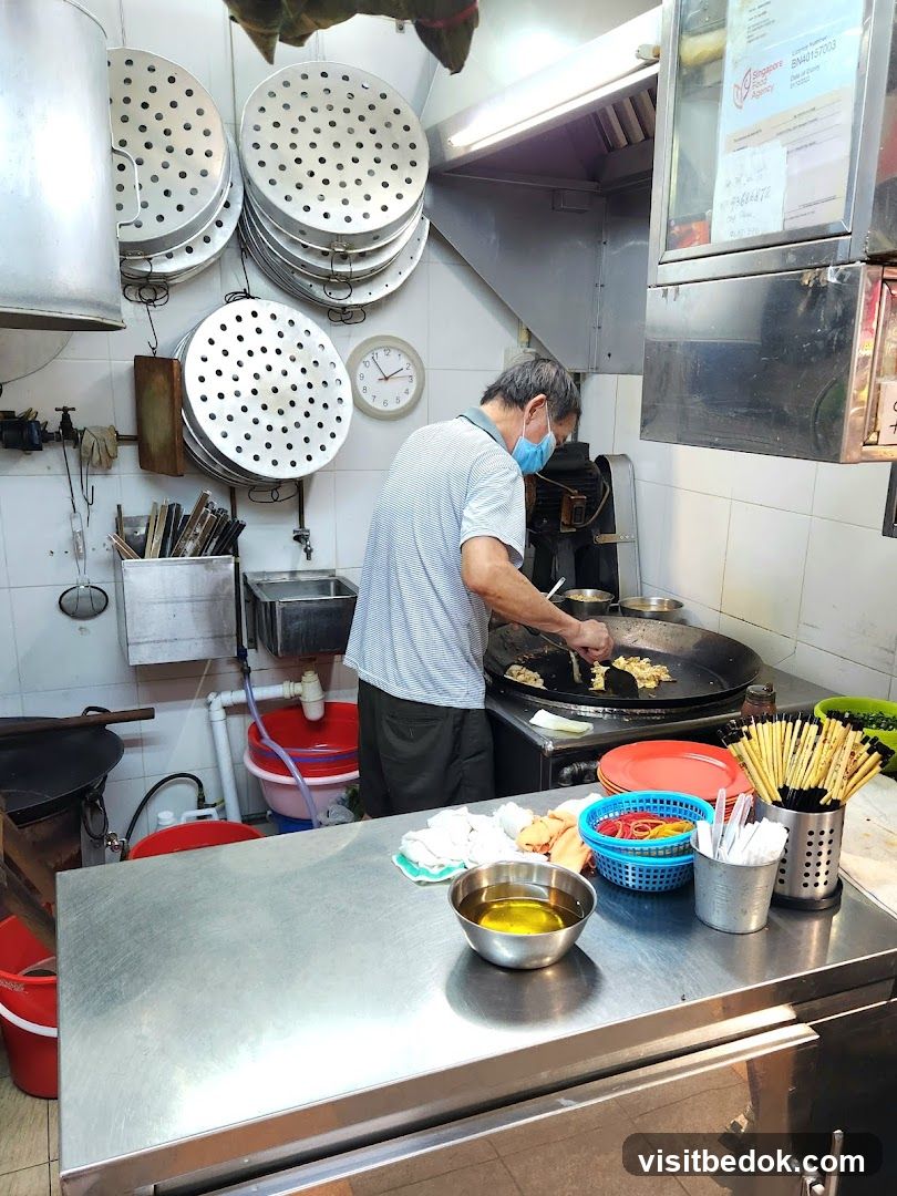 Cook preparing food in a commercial kitchen