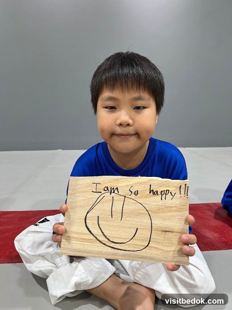 Child holding a drawing